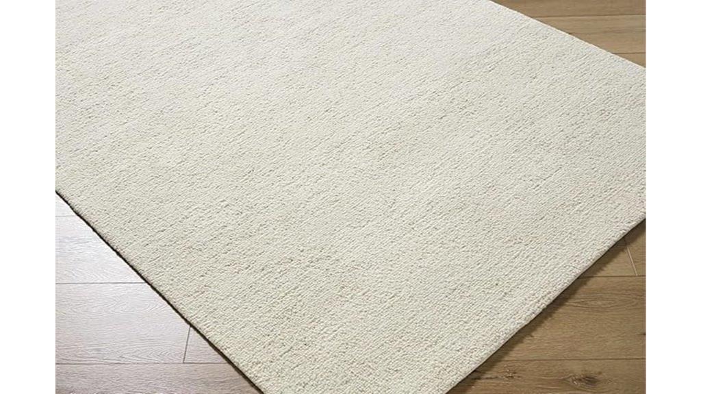 cream and white wool rug