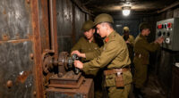 TIL during WWII, Britain hid its wealth 3 floors under Montreal's Sun Life building. The vault had microphone alarms, walls made of abandoned railway steel, and a door needing 2 blind, simultaneous codes. 120 secret workers sorted billions under strict oaths to keep the entire operation hidden.